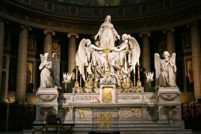 sculpture of Mary Magdalene on the altar in a church in Paris