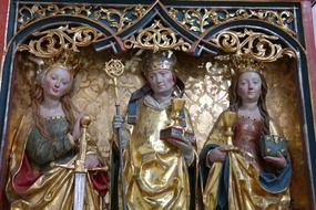 gilded icon of saint catherine in protestant church
