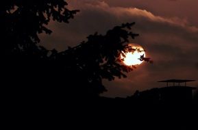 bright moon in the dark sky