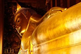 Golden buddha statue in a temple