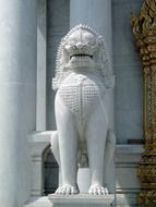 Stone temple lion guardian in Thailand