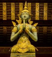 statue of a praying buddha in north Thailand