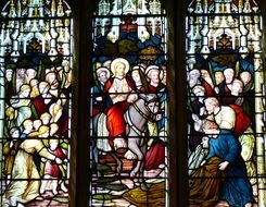 stained glass window with biblical story of the church in England