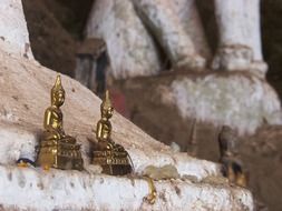 golden statues buddha in laos