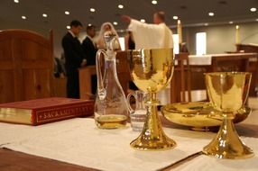 table with gold cups in the church
