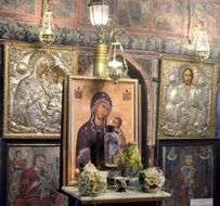 Orthodox icons and wedding bouquets