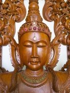 wooden religious buddha statue