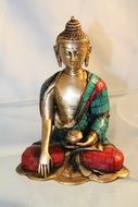 Buddha sculpture near the wall