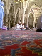 men pray in the mosque