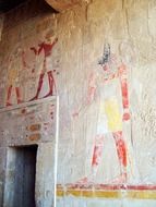 anubis painting on wall of Mortuary Temple of Queen Hatshepsut, egypt, luxor