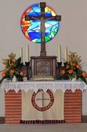 church altar on the stained glass window background