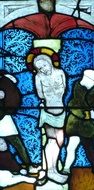 crucifix on a church stained glass window