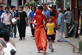 young man in religious attire in Nepal