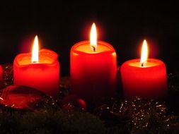 red wreath candles