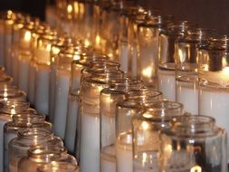 candles during prayer in the temple