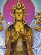 golden statue in buddhist temple