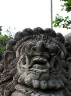 hindu statue, face with big teeth, indonesia, java