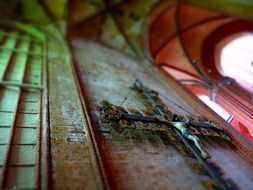cross on church wall close up