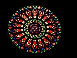 multi-colored crooked stained glass window in a church