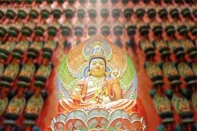 buddha sitting on lotus, colorful statue