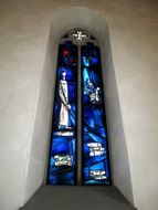 oblong stained glass window in a church