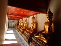 golden buddha statue in a buddhist temple in Bangkok