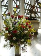 a bouquet of flowers in the church