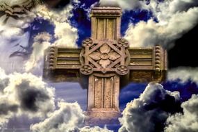 A huge cross in the ornament among the clouds