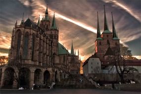 the sunset over the the old towers of the cathedral in Erfurt