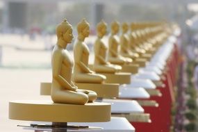 a lot of buddhas on a temple