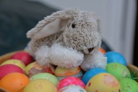 plush rabbit and colored eggs