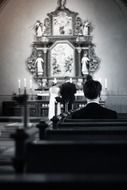 photo of the lonely man in a church