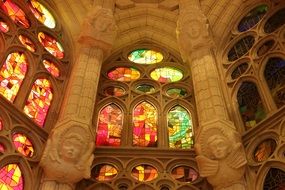 colored stained glass windows in the Temple of the Holy Family