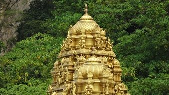 golden statue in Batu Caves