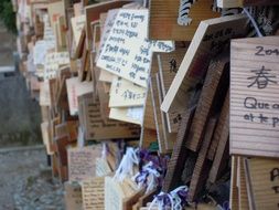 wooden plaques with inscriptions in japan