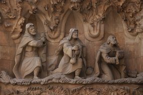 statues near the wall on the cathedral