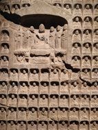 ancient stone carved figures on wall, china