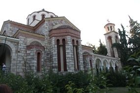 round stone church among nature