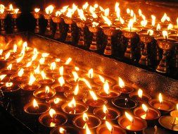 candles in a buddhist temple in Nepal