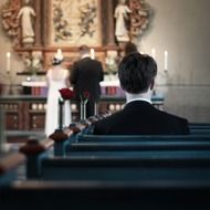 man sitting alone in the church