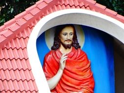 statue of Jesus in the den