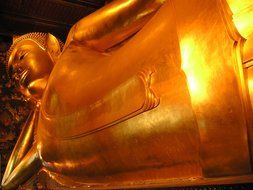 huge golden buddha in thailand close up