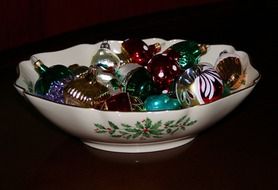 christmas balls in a porcelain bowl