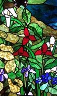 decorative bright flower on the stained glass