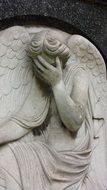 angel crying statue