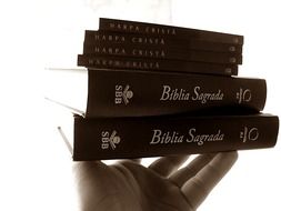 bible books in hand close up