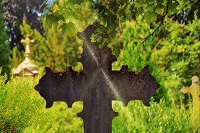 metal cross at the cemetery religion