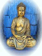 seated buddha statue near the wall