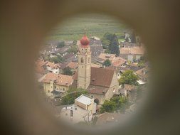 view of the church through binoculars