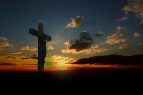 jesus on the cross at sunset